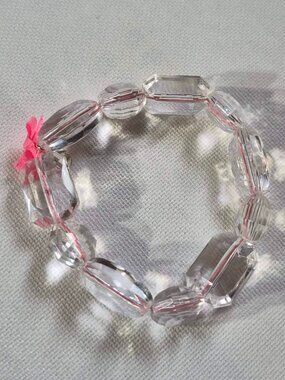 Stella & Dot Clear Faceted Bead Elastic Bracelet with Pink Ribbon Charm